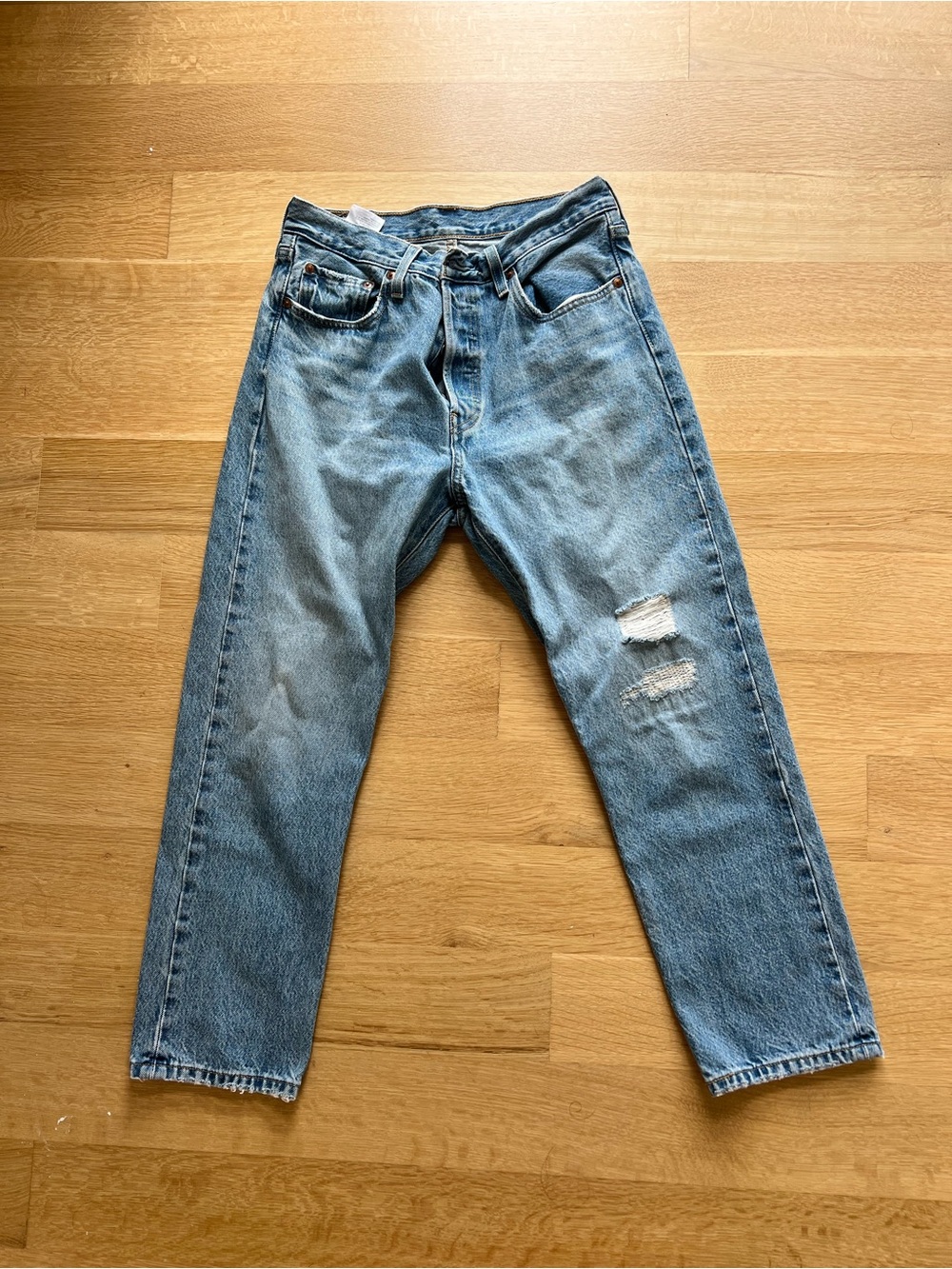 Levi’s 501 Blue Distressed Jeans